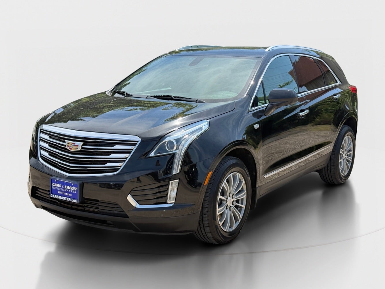 2017 Cadillac XT5 Luxury in Stellar Black Metallic — front three-quarter view