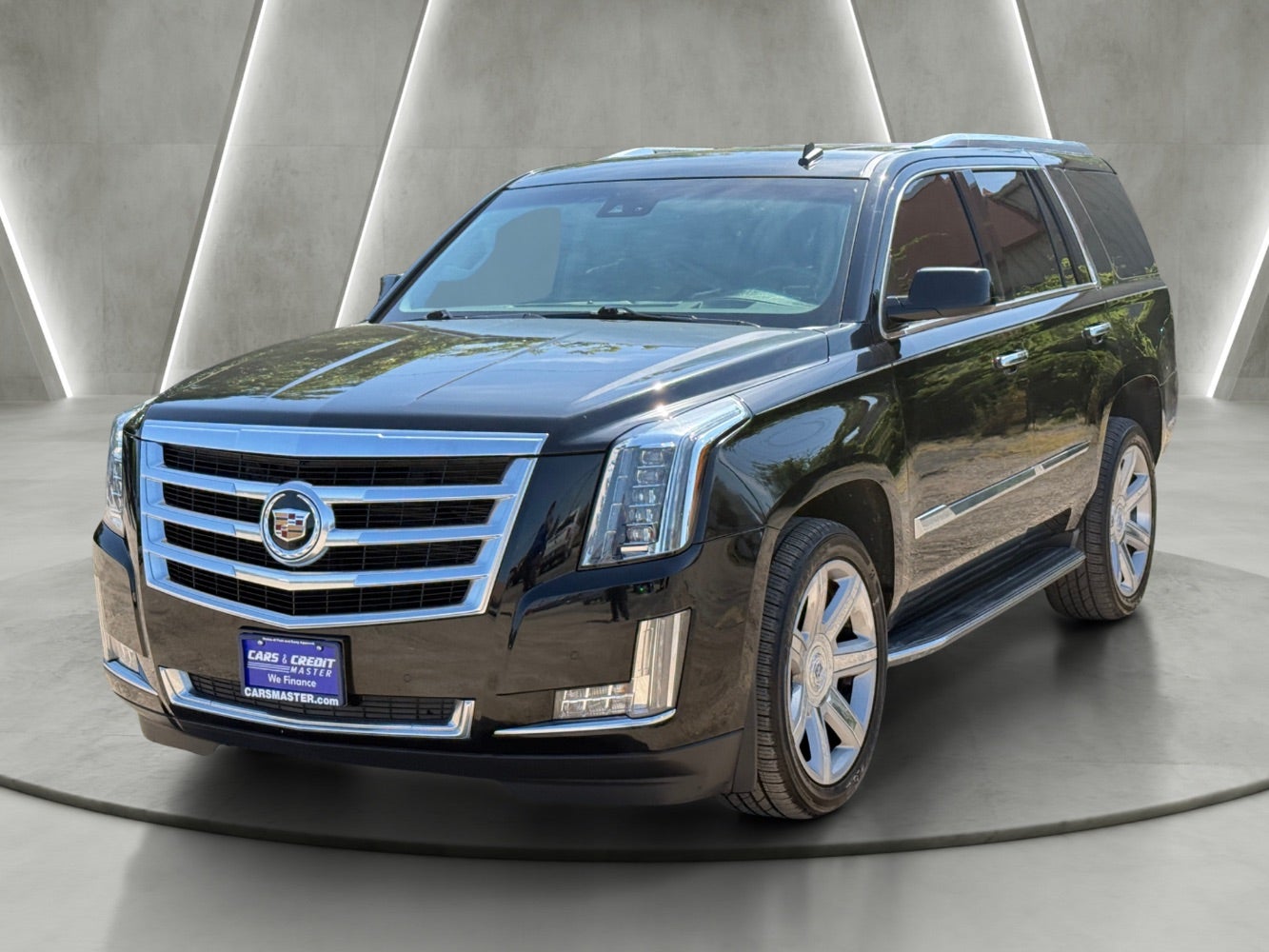 2015 Cadillac Escalade Luxury in Black Raven — front three-quarter view